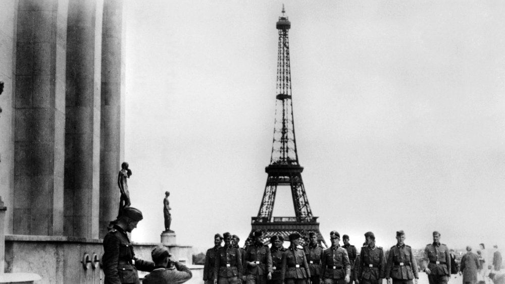 Members of the SS visiting the Eiffel Tower, Paris, July 1940. 