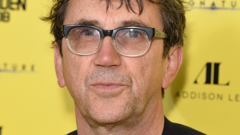Phil Daniels wearing glasses