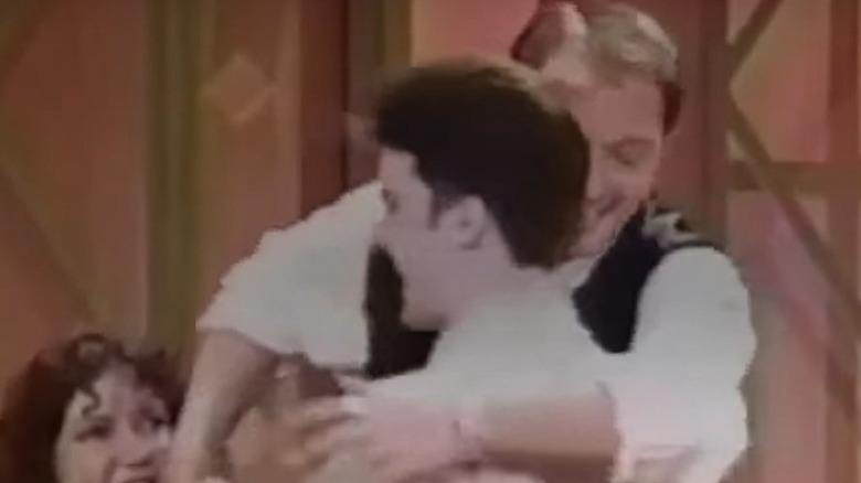 Amedure tries to embrace Schmitz