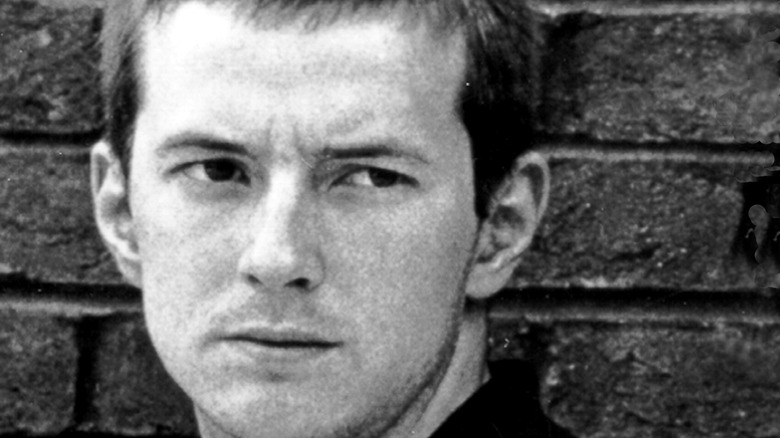 Eric Clapton poses for portrait with frown
