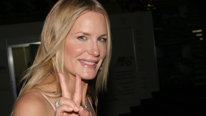 Daryl Hannah waves to the camera