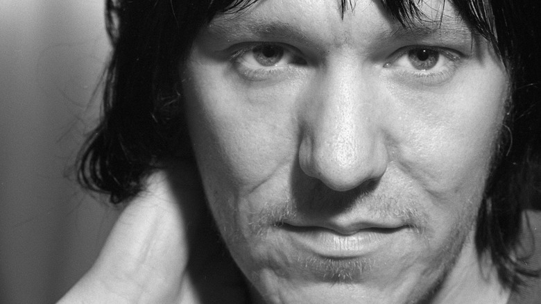 Elliott Smith with hand on neck