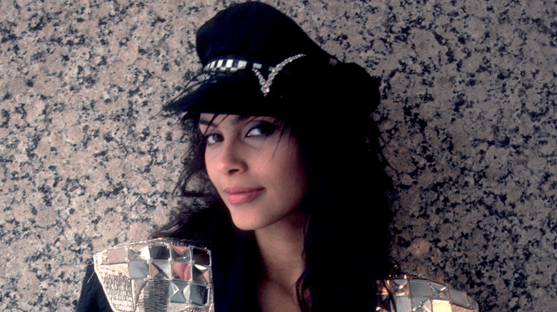 Vanity wearing hat and smiling