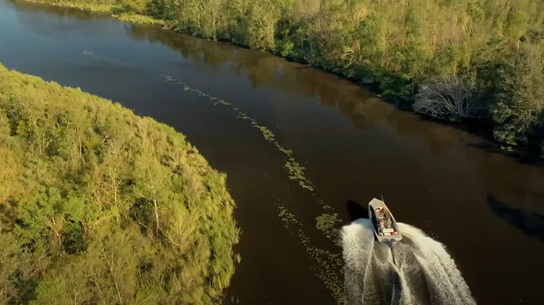 Swamp People on a boat river swamp aerial 