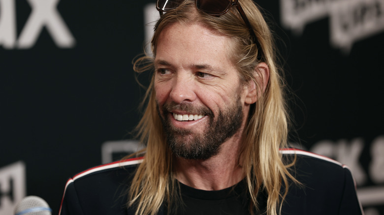 Taylor Hawkins smiling Rock and Roll Hall of Fame induction 2021