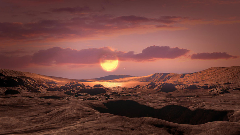 Artist's impression of the surface of a red dwarf planet.