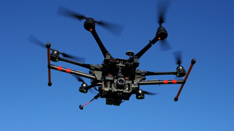 Large drone with camera in flight