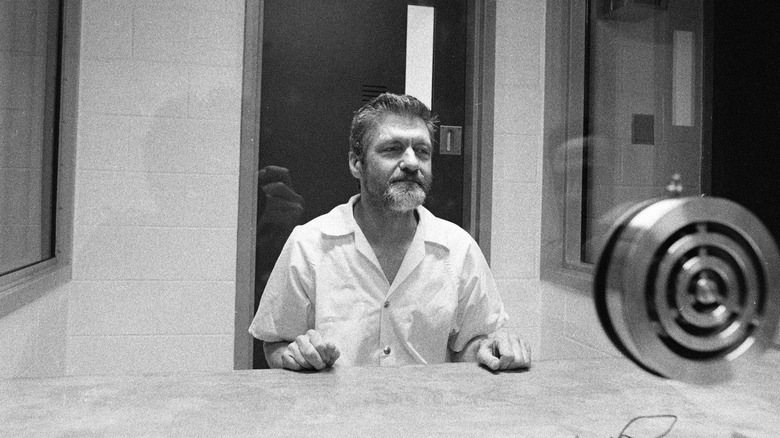 The Unabomber in prison behind glass