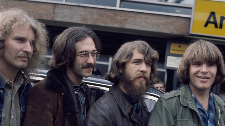 Creedence Clearwater Revival standing together
