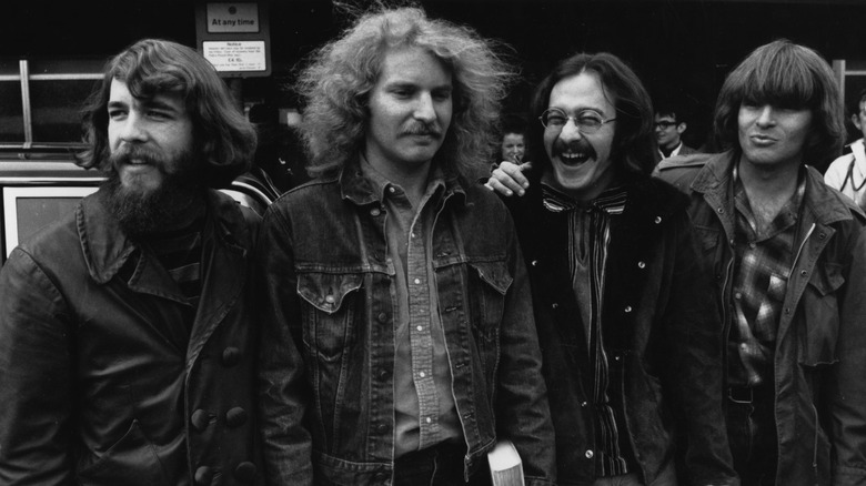 Creedence Clearwater Revival standing together