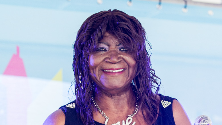 Alice Tan Ridley smiling and singing