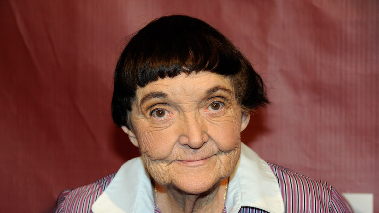 Grandma Lee smirking into camera