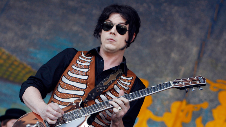 Jack White playing guitar
