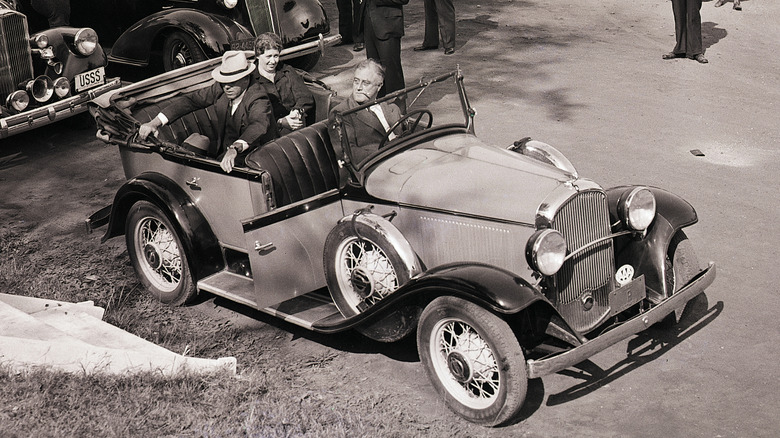 Franklin D. Roosevelt driving people around in his Plymouth PA Phaeton