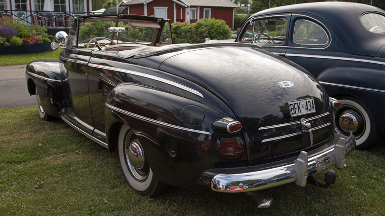 A modern photo of a 1946 Ford Super Deluxe convertible from the rear
