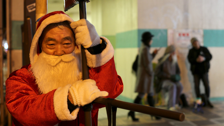 Japanese man in Osaka dressed as Santa Claus costume 