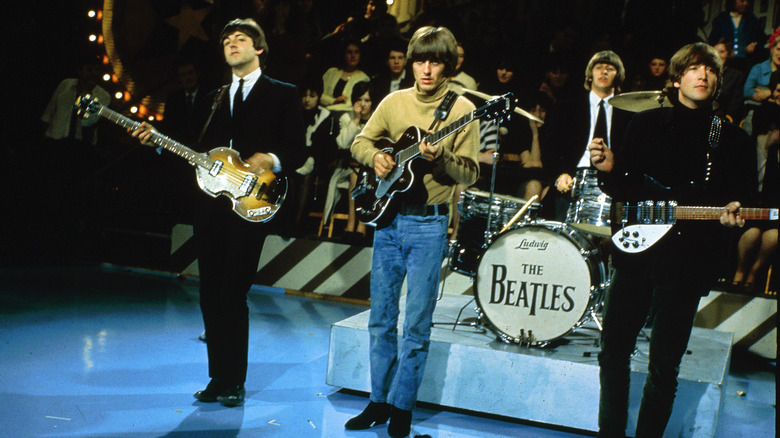 The Beatles playing on a TV show