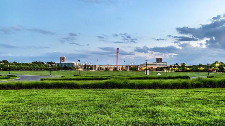 View across a field of the SUNY-Albany campus at sunset