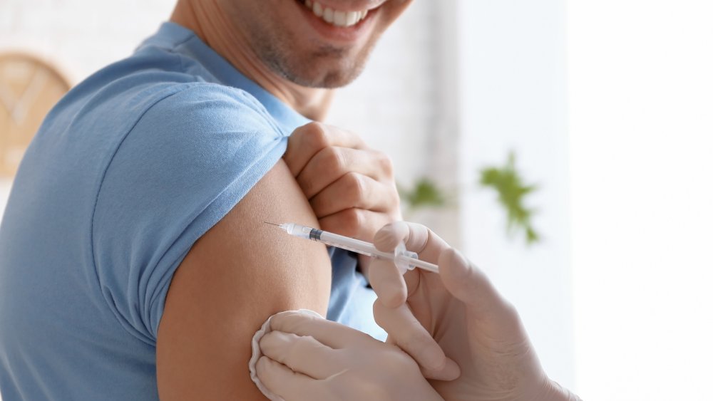 man gets vaccine