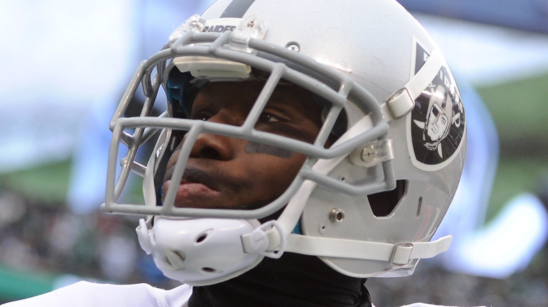 Phillip Adams in Raiders helmet