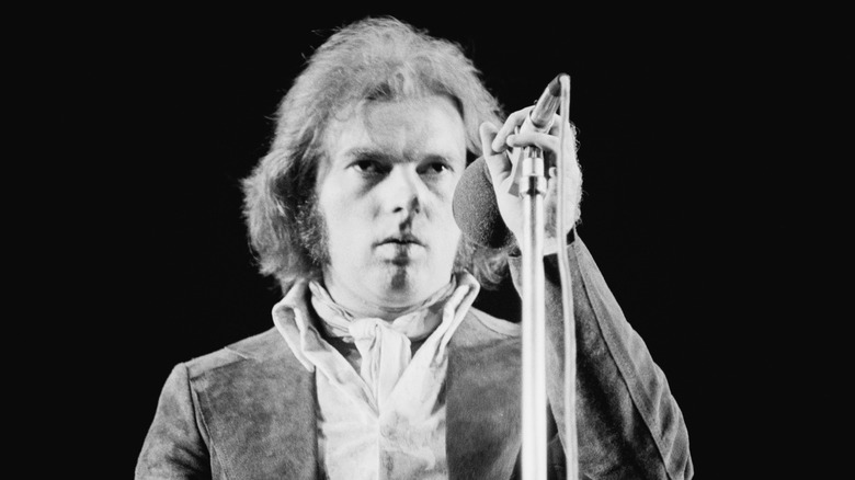 Van Morrison onstage with microphone