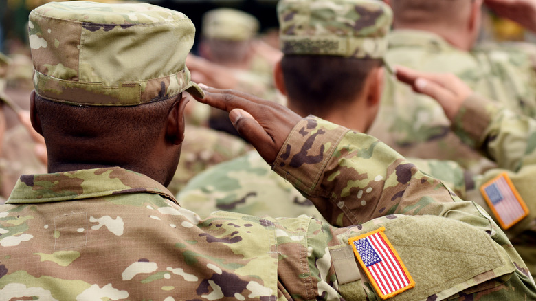 Soldiers saluting