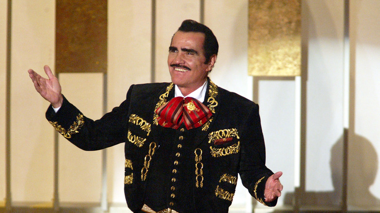 Vicente Fernandez in black and gold jacket
