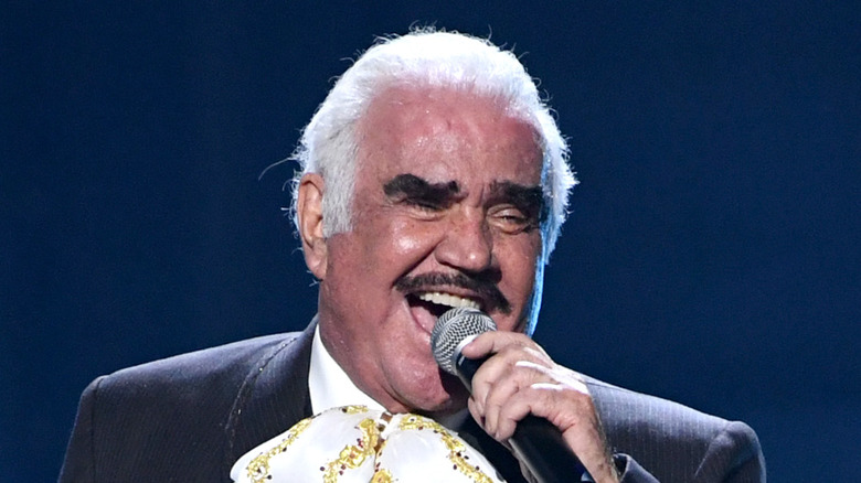 Vicente Fernandez with a microphone