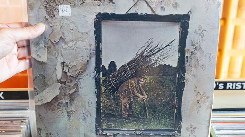 hand holding Led Zeppelin IV