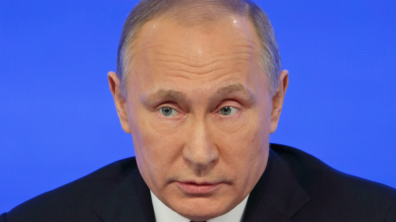 Vladimir Putin blue background
