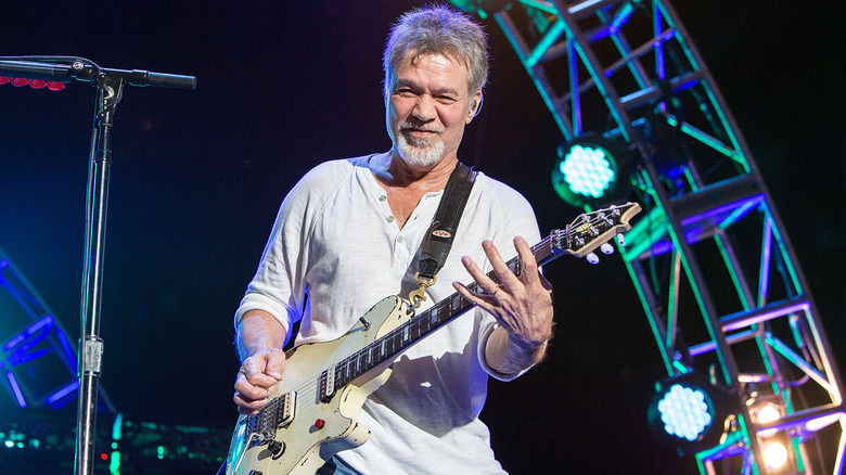 Eddie Van Halen playing guitar onstage
