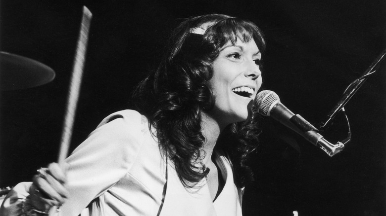 Karen Carpenter singing while playing drums onstage