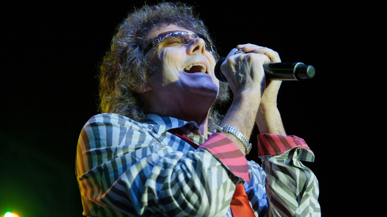 Mickey Thomas singing onstage