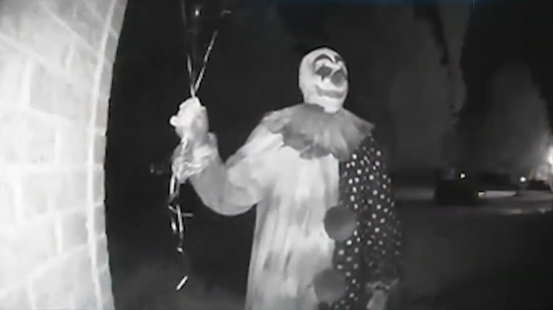 Screenshot of clown on home security camera