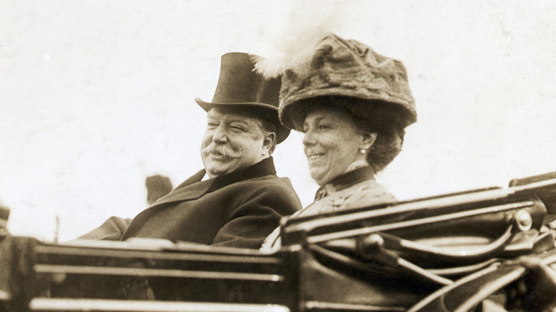 William Howard Taft riding in a carriage with his wife Helen