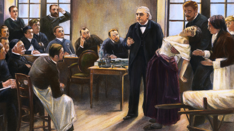 Illustration of Jean-Martin Charcot giving clinical lecture on hysteria with swooning female patient