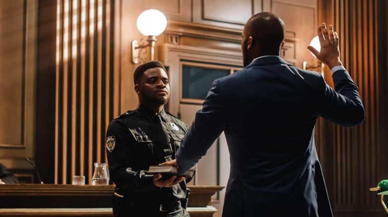 Witness being sworn in