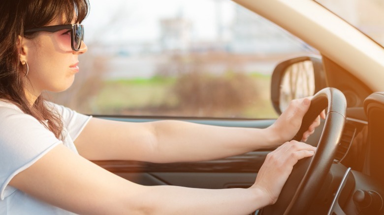 woman honking car horn