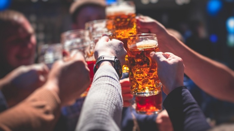 toasting with beer