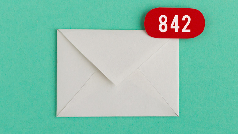Envelope on green background