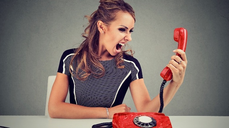 Yelling at phone
