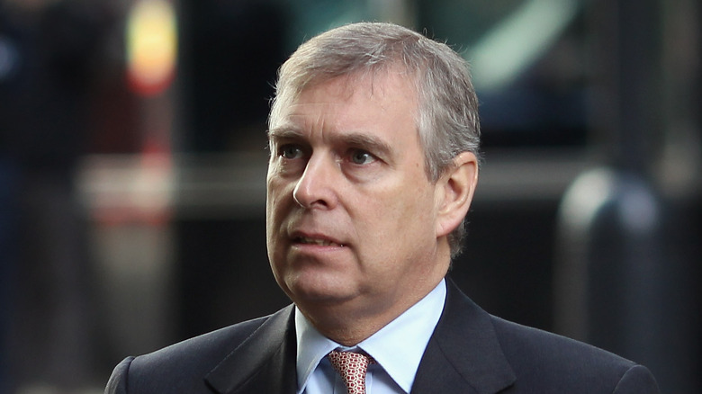 Prince Andrew looking up with windswept hair