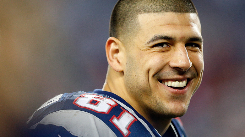 Aaron Hernandez smiling on football field
