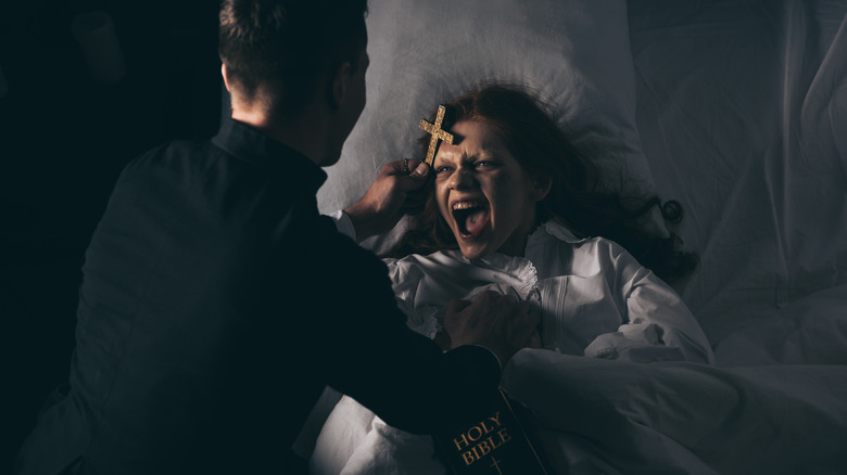 Priest performing an exorcism