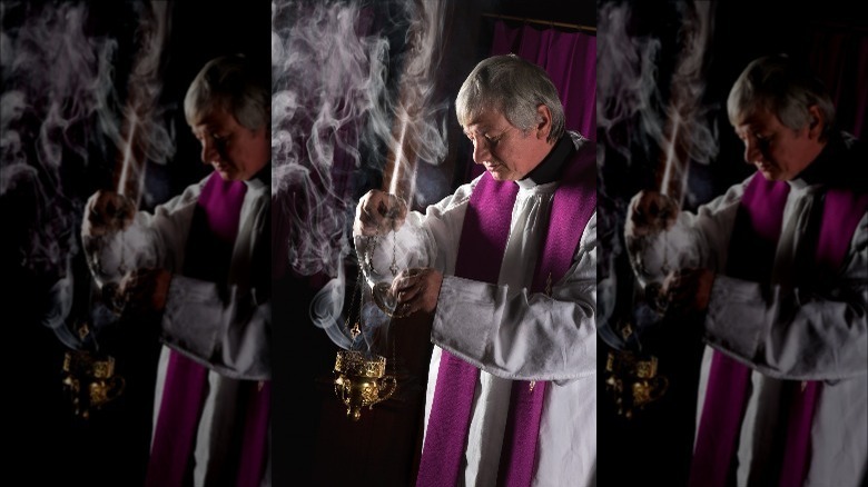 Priest in surplice and purple stole