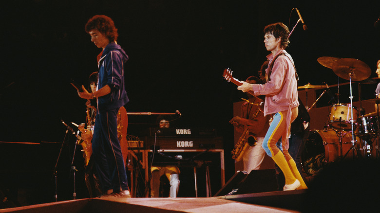 Bill Wyman and Mick Jagger in concert