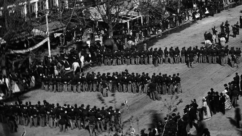 Large funeral procession aerial photo