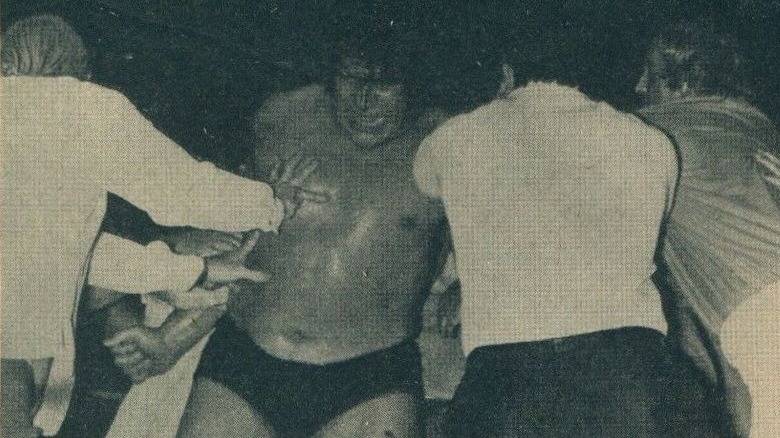 newspaper photo of Andrew wrestling