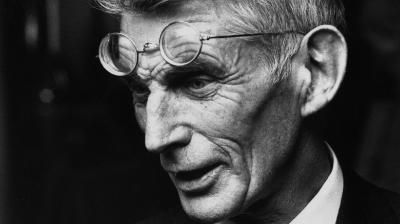 Samuel Becket wearing glasses