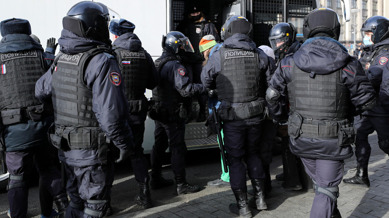 Russian police detain protester